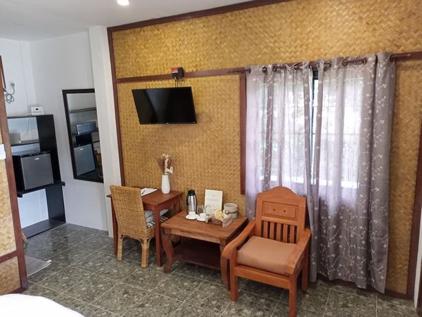 Imagen de la habitación del Hotel Las Cabanas Beach Resort. Foto 18