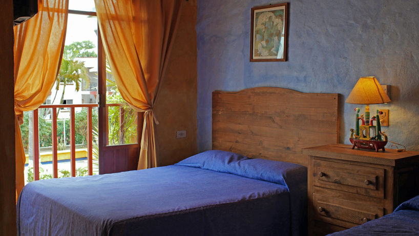 Imagen de la habitación del Hotel Las Cabanas Del Capitan. Foto 2