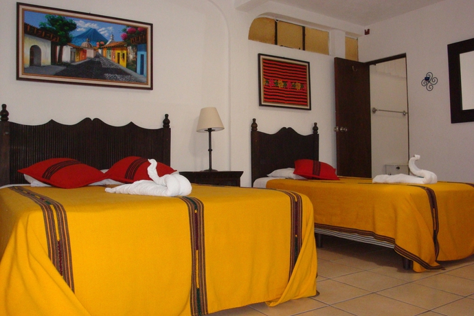 Imagen de la habitación del Hotel Las Camelias Inn. Foto 4