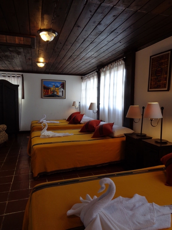 Imagen de la habitación del Hotel Las Camelias Inn. Foto 6