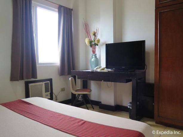 Imagen de la habitación del Hotel Las Casitas De Angela. Foto 18