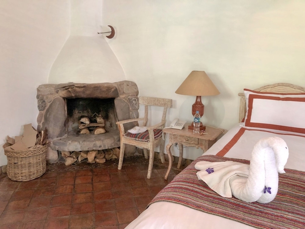 Imagen de la habitación del Hotel Las Casitas del Arco Iris. Foto 8