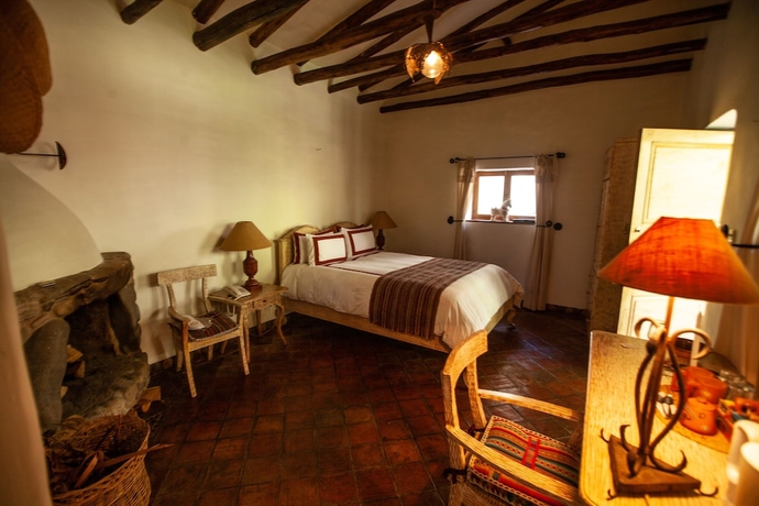 Imagen de la habitación del Hotel Las Casitas del Arco Iris. Foto 10