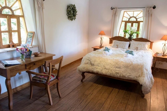 Imagen de la habitación del Hotel Las Casitas del Arco Iris. Foto 12