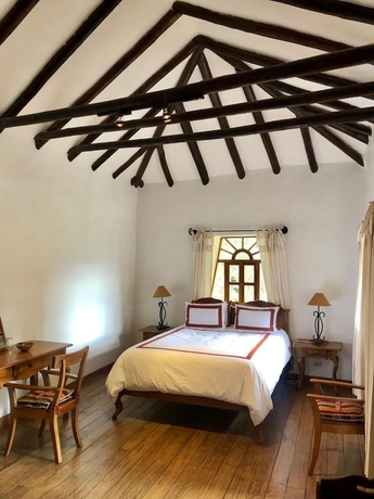 Imagen de la habitación del Hotel Las Casitas del Arco Iris. Foto 13