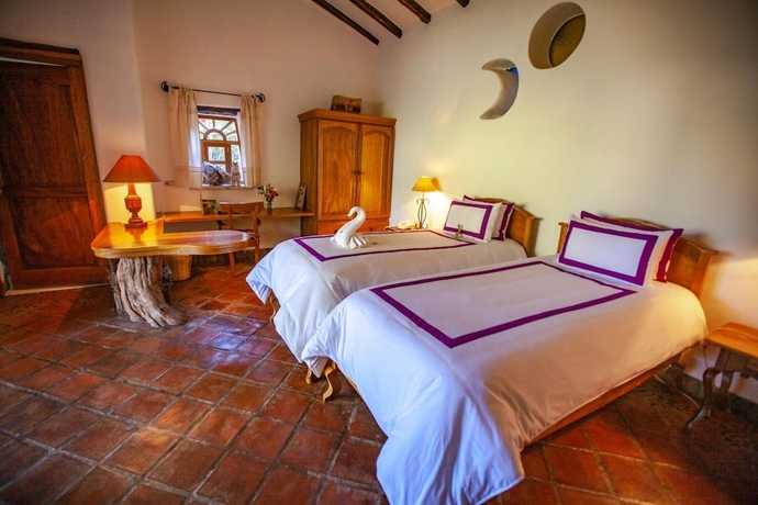 Imagen de la habitación del Hotel Las Casitas del Arco Iris. Foto 15