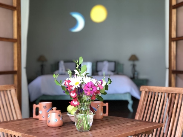 Imagen de la habitación del Hotel Las Casitas del Arco Iris. Foto 18