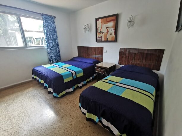Imagen general del Hotel Las Dalias Inn. Foto 11