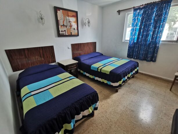 Imagen de la habitación del Hotel Las Dalias Inn. Foto 15