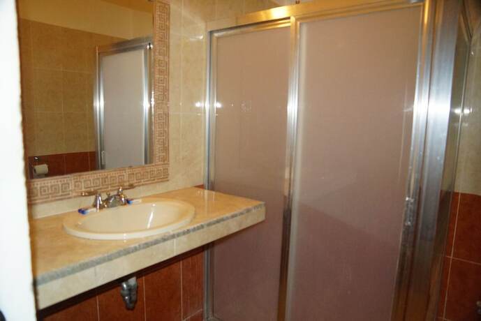 Imagen de la habitación del Hotel Las Dalias Inn. Foto 17