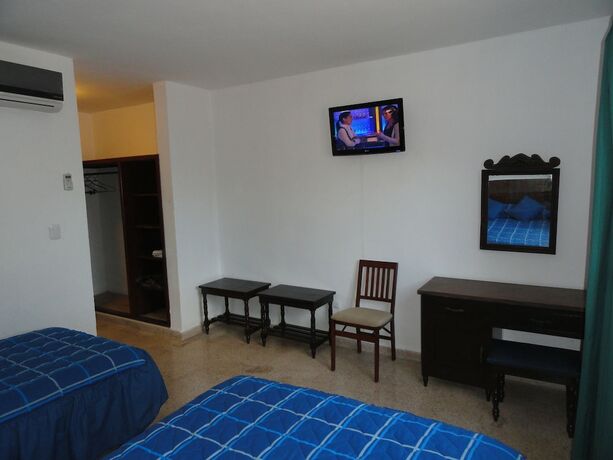 Imagen de la habitación del Hotel Las Dalias Inn. Foto 18