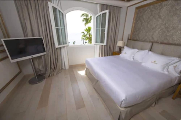 Imagen de la habitación del Hotel Las Dunas Grand Luxury. Foto 7
