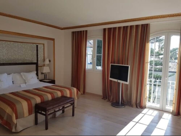 Imagen de la habitación del Hotel Las Dunas Grand Luxury. Foto 17