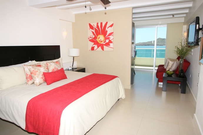 Imagen de la habitación del Hotel Las Flores Beach Resort. Foto 6