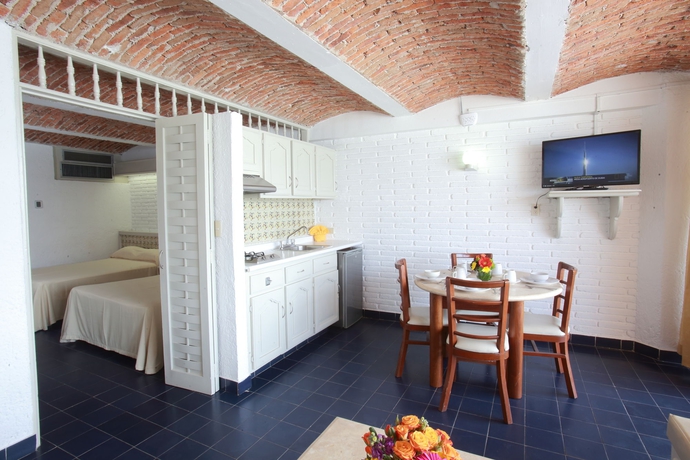 Imagen de la habitación del Hotel Las Flores Beach Resort. Foto 7