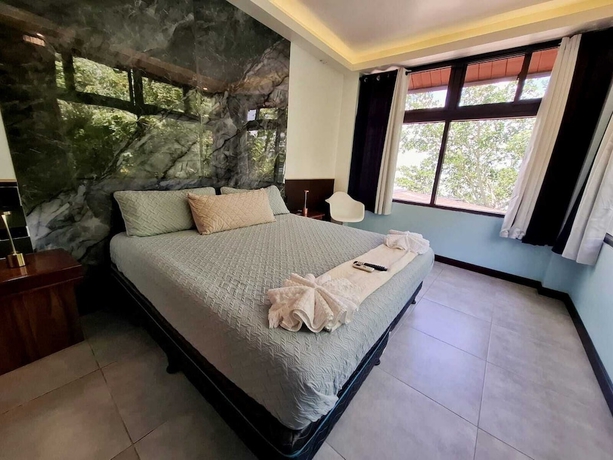 Imagen de la habitación del Hotel Las Luciernagas Boutique. Foto 11