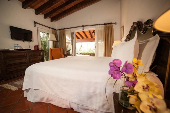 Imagen de la habitación del Hotel Las Mananitas Garden Restaurant and Spa. Foto 14