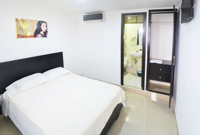 Imagen de la habitación del Hotel Las Margaritas Alojamientos. Foto 19