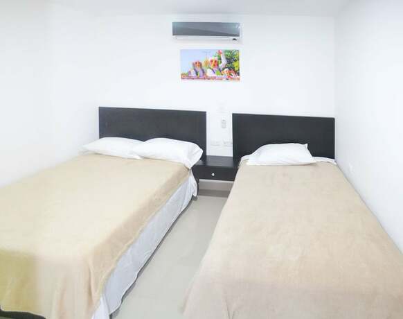 Imagen de la habitación del Hotel Las Margaritas Alojamientos. Foto 20