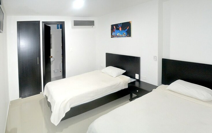 Imagen de la habitación del Hotel Las Margaritas Alojamientos. Foto 21