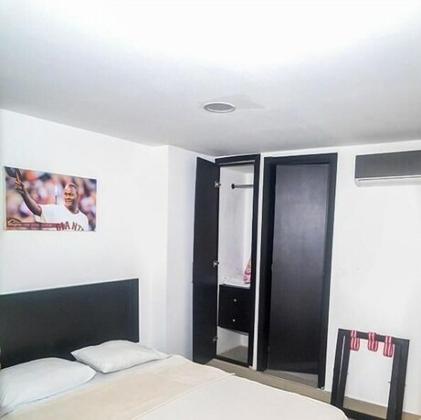 Imagen de la habitación del Hotel Las Margaritas Alojamientos. Foto 22