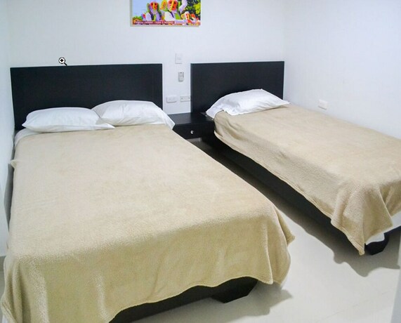 Imagen de la habitación del Hotel Las Margaritas Alojamientos. Foto 26