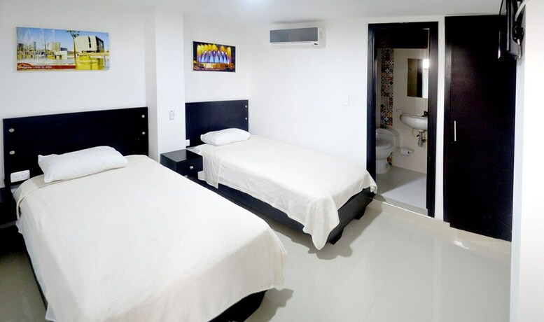 Imagen de la habitación del Hotel Las Margaritas Alojamientos. Foto 28