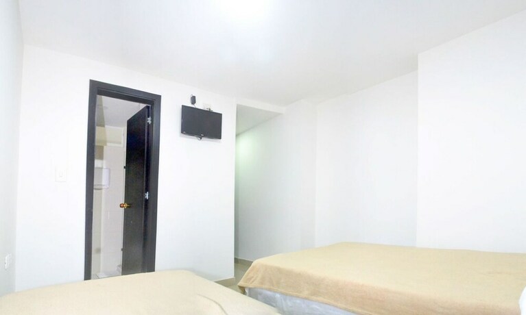 Imagen de la habitación del Hotel Las Margaritas Alojamientos. Foto 32