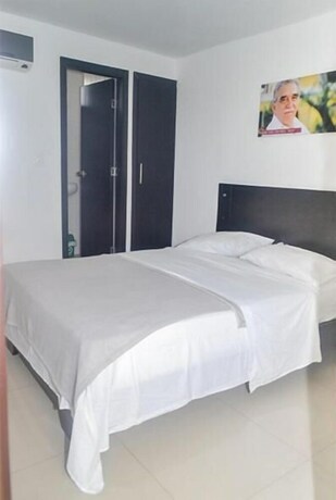Imagen de la habitación del Hotel Las Margaritas Alojamientos. Foto 33