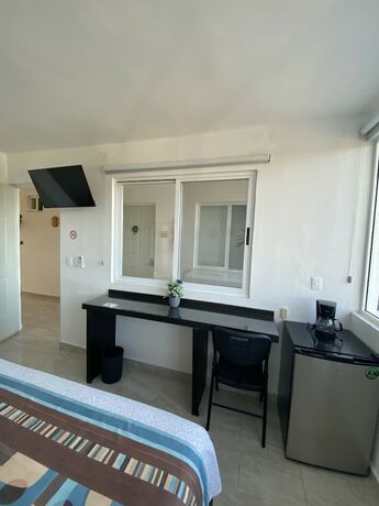 Imagen de la habitación del Hotel Las Palmas Puerto Morelos. Foto 16
