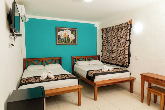 Imagen de la habitación del Hotel Las Palmas en Laurel. Foto 14