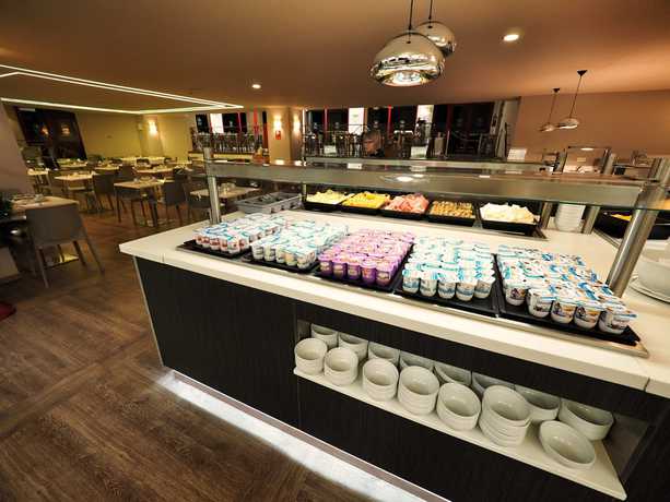 Imagen del bar/restaurante del Hotel Las Palmeras Affiliated by FERGUS. Foto 22