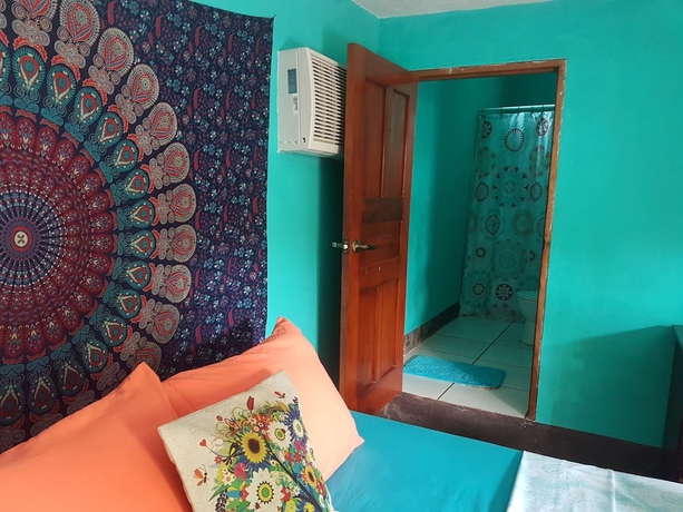 Imagen de la habitación del Hotel Las Palmeras Beachfront. Foto 5