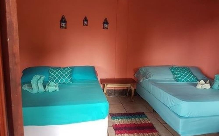 Imagen de la habitación del Hotel Las Palmeras Beachfront. Foto 6