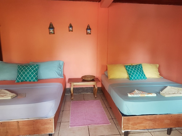 Imagen de la habitación del Hotel Las Palmeras Beachfront. Foto 10