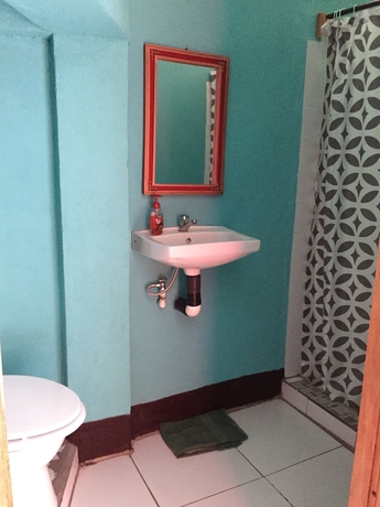 Imagen de la habitación del Hotel Las Palmeras Beachfront. Foto 14