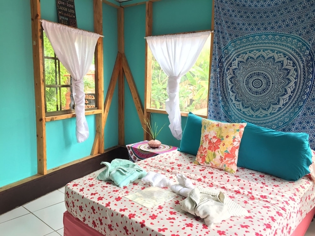 Imagen de la habitación del Hotel Las Palmeras Beachfront. Foto 15