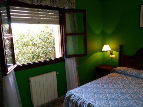 Imagen de la habitación del Hotel Las Palmeras, Celorio. Foto 9