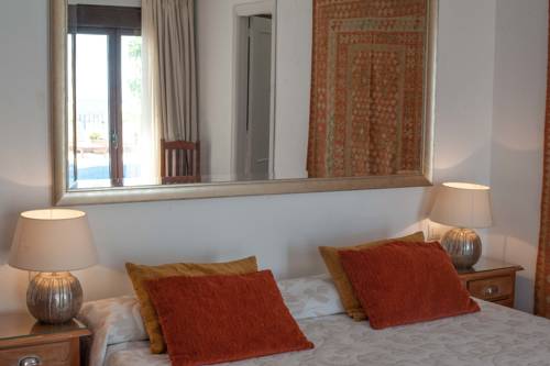 Imagen de la habitación del Hotel Las Palmeras del Califa. Foto 6