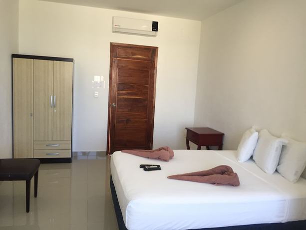 Imagen de la habitación del Hotel Las Perlas Condo. Foto 4