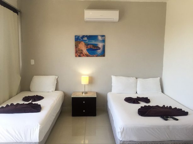 Imagen de la habitación del Hotel Las Perlas Condo. Foto 5