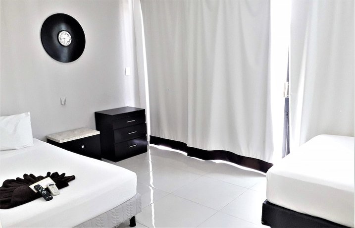 Imagen de la habitación del Hotel Las Perlas Condo. Foto 6