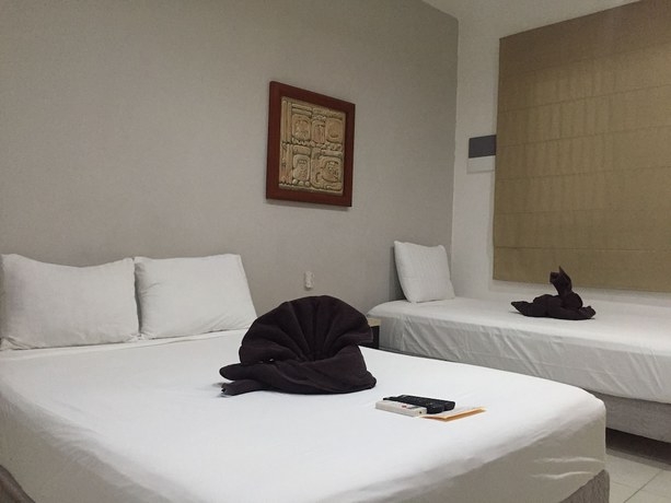 Imagen de la habitación del Hotel Las Perlas Condo. Foto 7