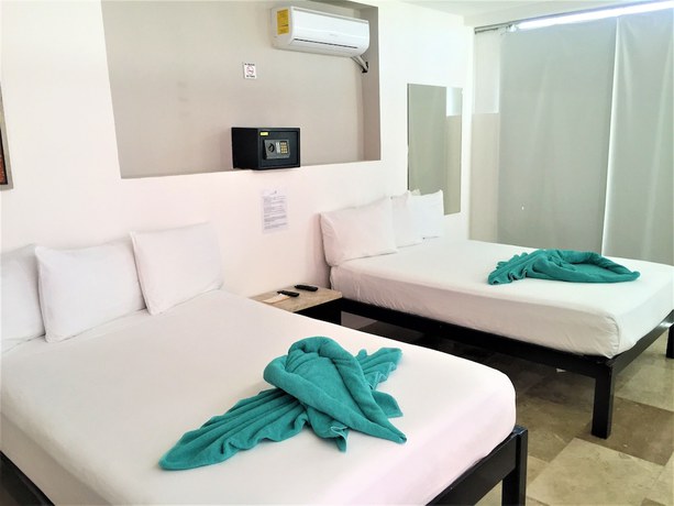 Imagen de la habitación del Hotel Las Perlas Condo. Foto 11