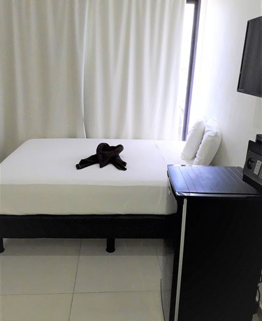 Imagen de la habitación del Hotel Las Perlas Condo. Foto 12
