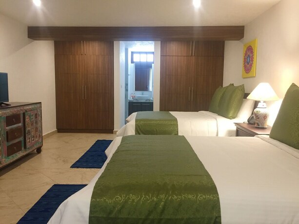 Imagen de la habitación del Hotel Las Puertas De Tepoztlan. Foto 26