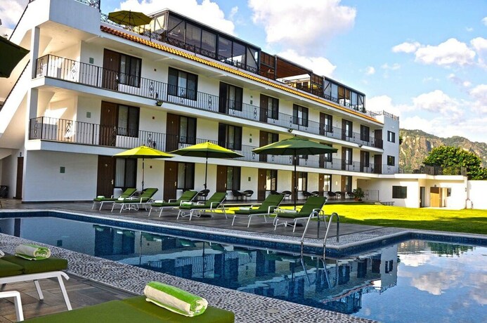 Imagen de la piscina del Hotel Las Puertas De Tepoztlan. Foto 35