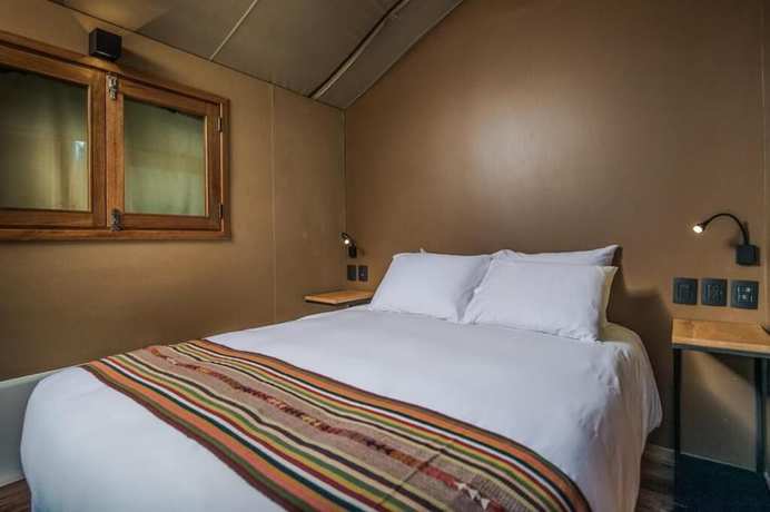 Imagen de la habitación del Hotel Las Qolqas Eco Resort. Foto 17