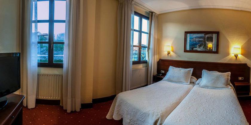 Imagen de la habitación del Hotel Las Rocas. Foto 7