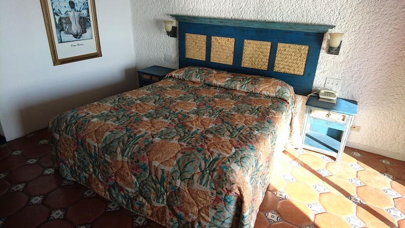 Imagen de la habitación del Hotel Las Rocas Resort and Spa. Foto 5